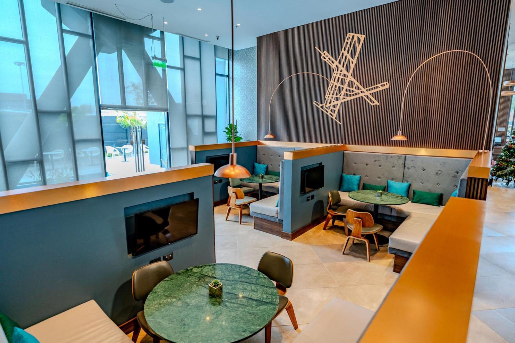 Courtyard By Marriott Santiago Airport Hotel Exterior photo